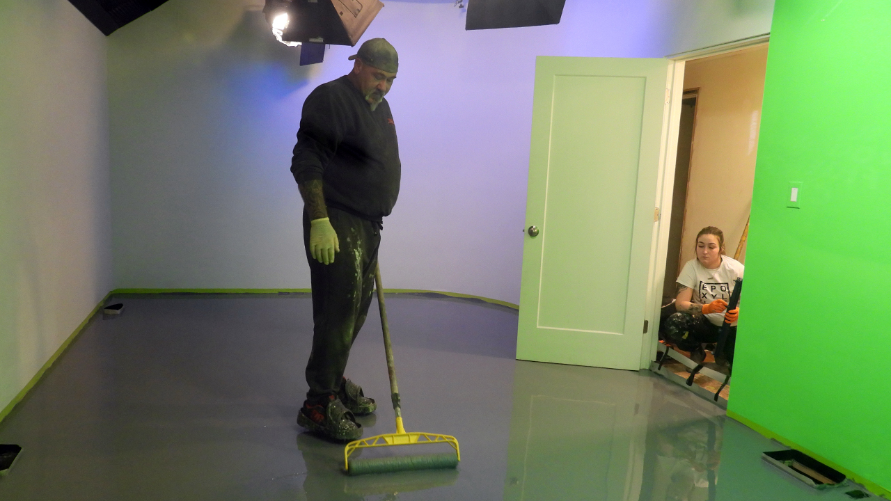 An epoxy floor was poured and leveled for smooth camera movement.